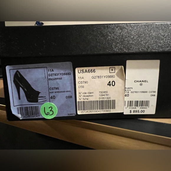 AUTHENTIC Chanel black leather heels with silver cap toe and “CC” logo. - Picture 9 of 9